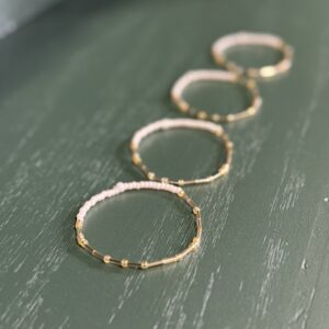 Morse code bracelets on a table.